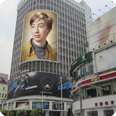 Photo effect - Tremendous ad on the buildings corner