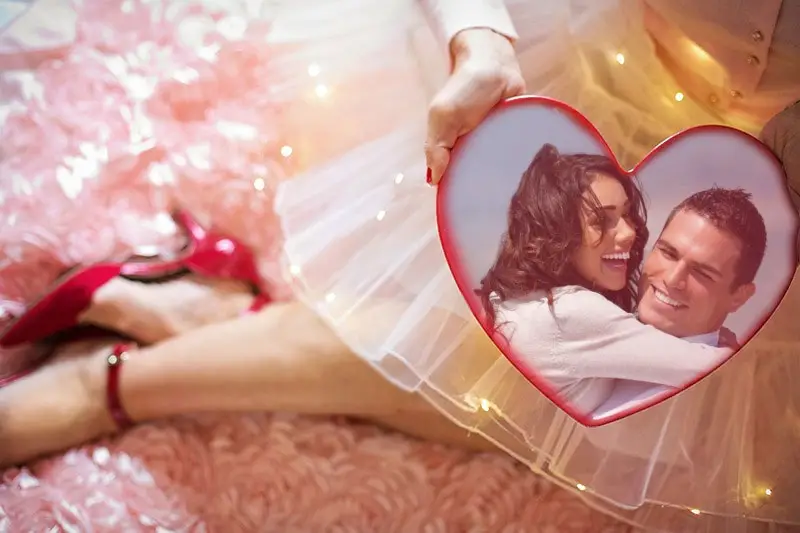 Photo effect - Valentines Day. Holding a heart in hands