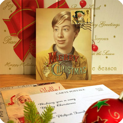 Photo effect - Vintage Christmas postcard on the table